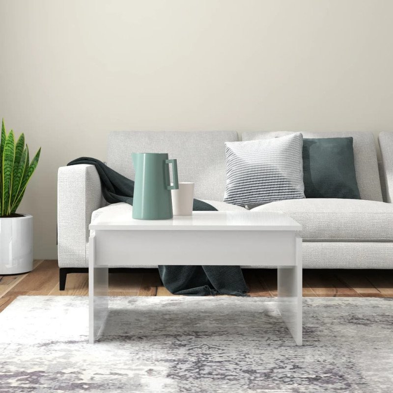 vidaXL Konferenčný stolík lesklý biely 68x50x38 cm drevotrieska